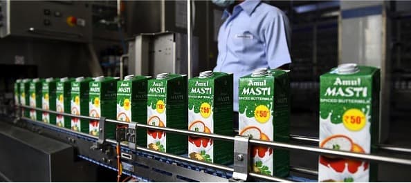 Flavoured milk is not milk but a drink containing milk. So pay 12% GST